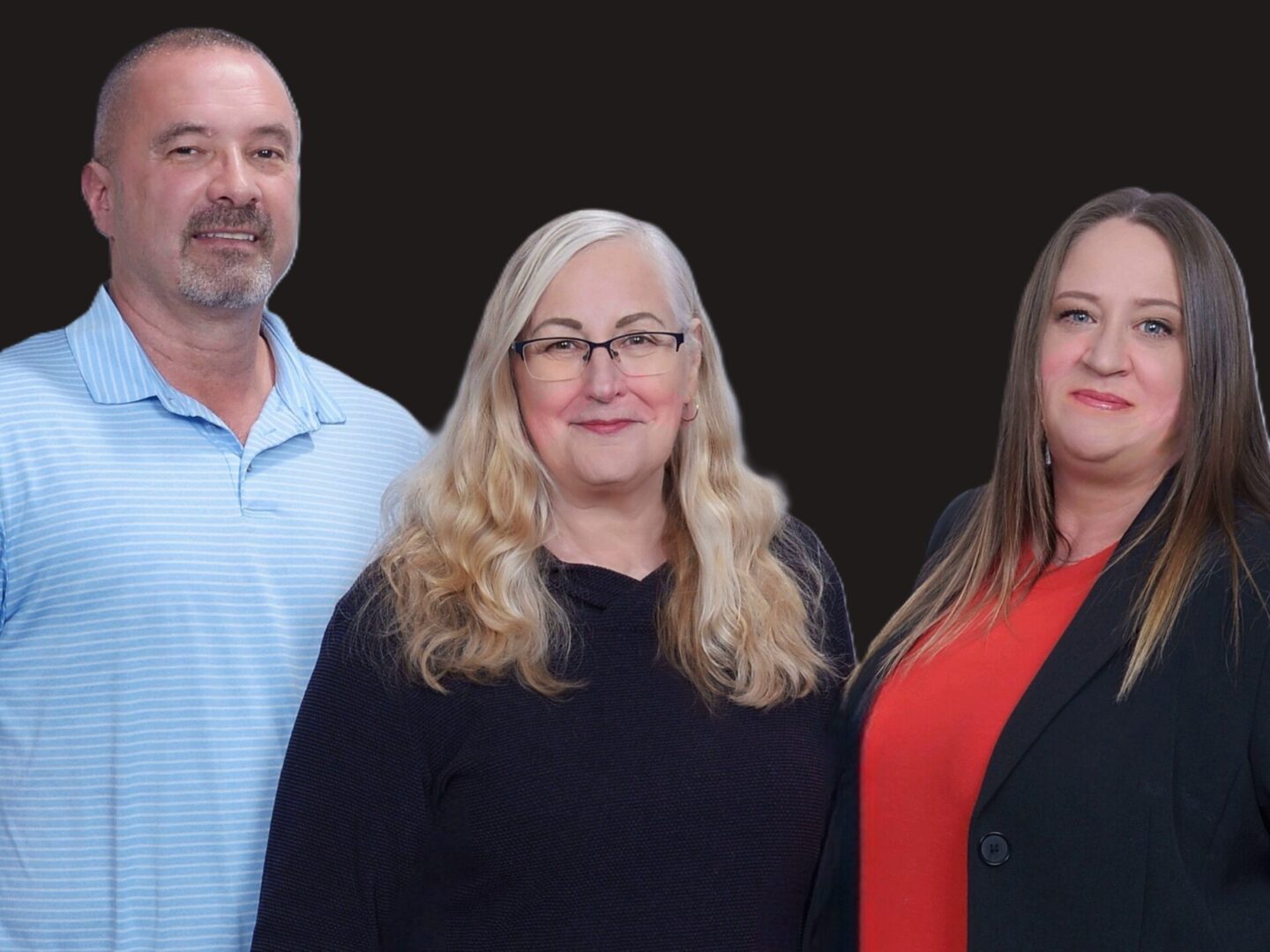 Three people standing in front of a black background.